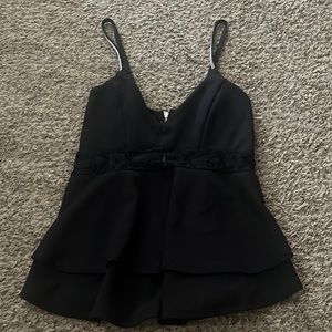 I am selling this rue 21 tank top. It is a size medium. Never wore.